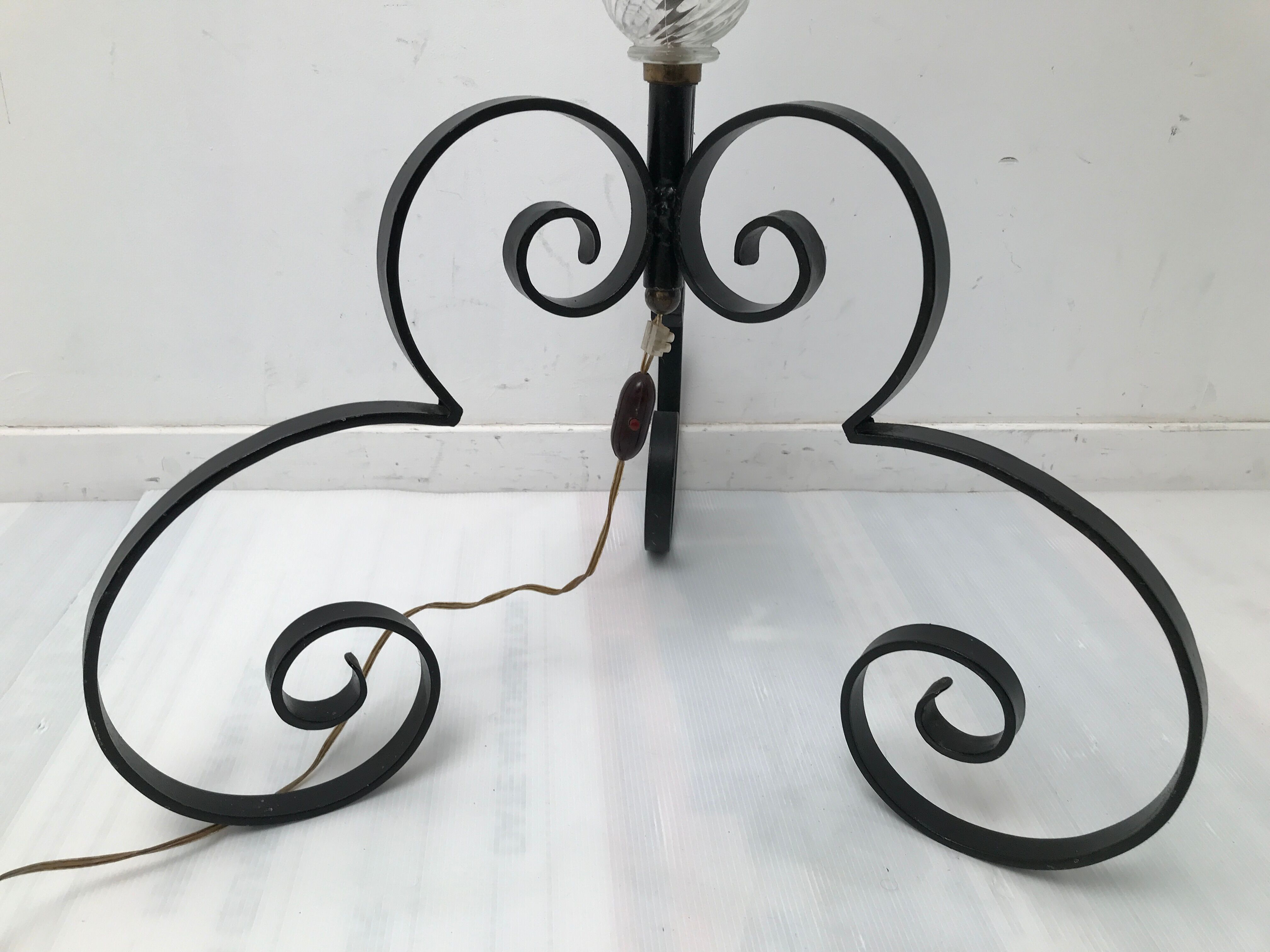 Glass lamp foot and wrought iron