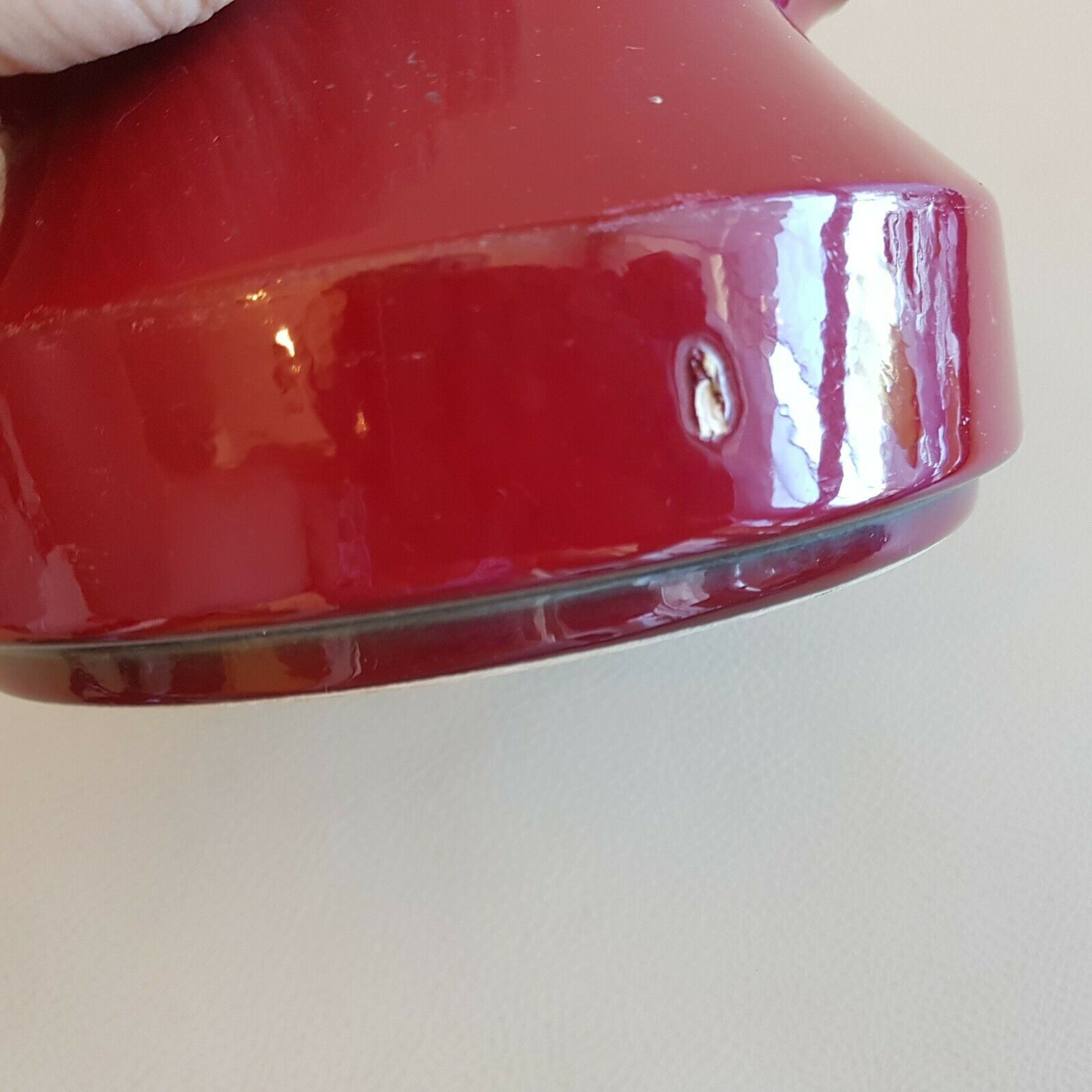 Teapot and milk jar in burgundy red ceramic