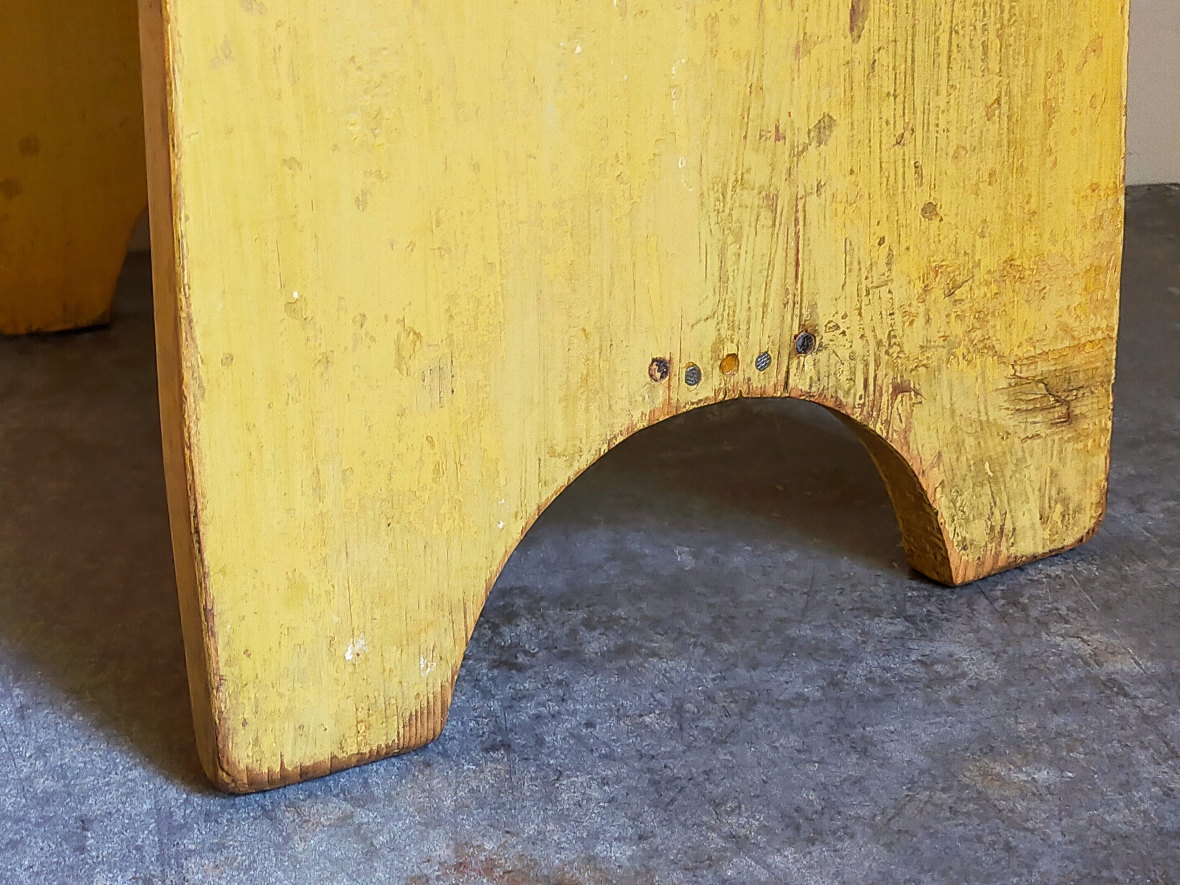 Art-populaire workshop stool in patinated painted wood