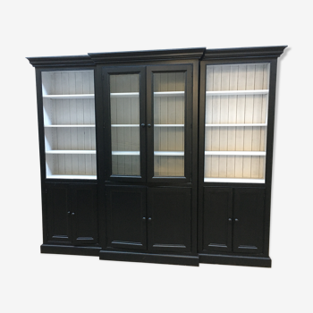 Black patinated wooden bookcase