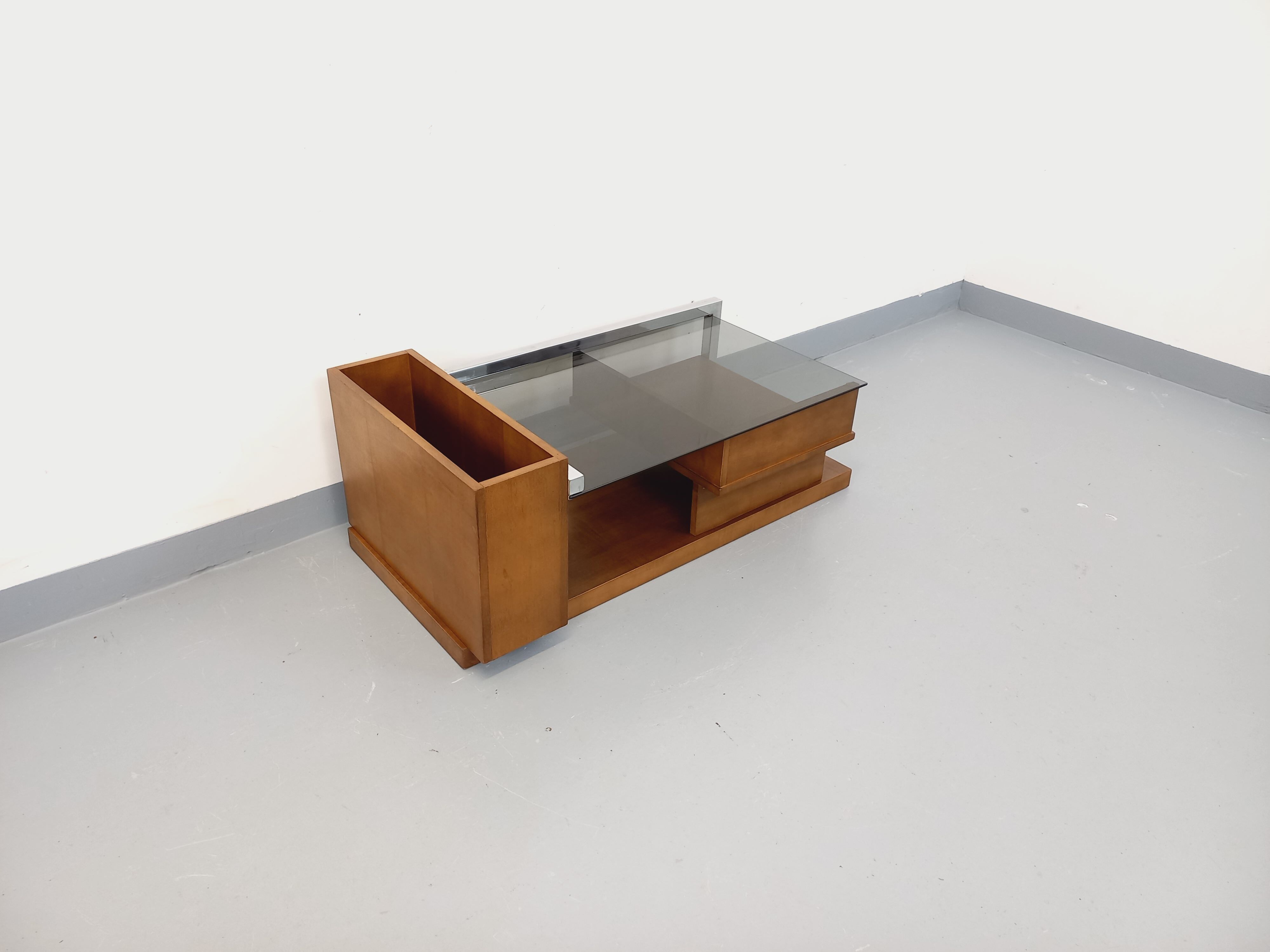 Rectangular vintage modernist coffee table with wooden niches, chrome.