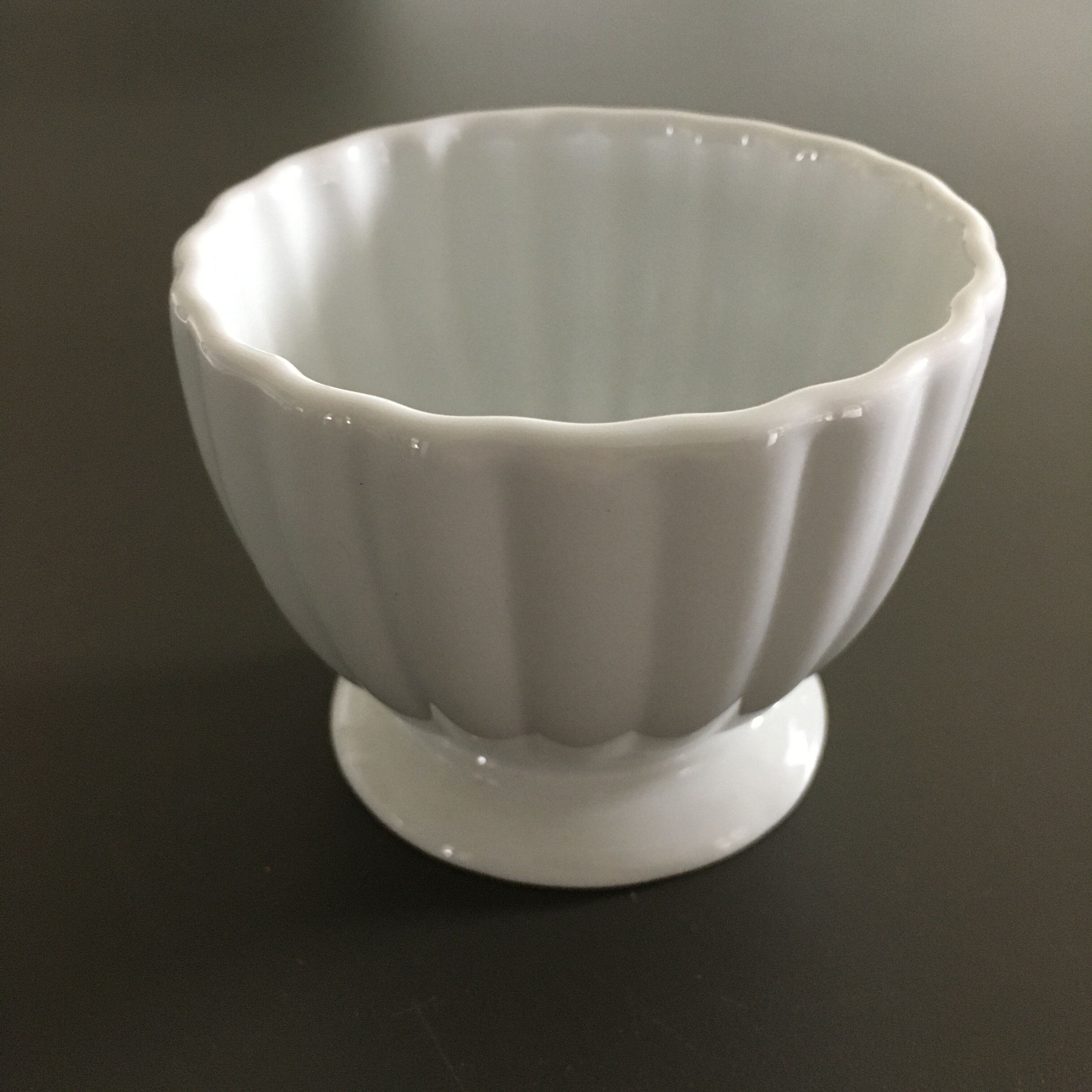 Scalloped porcelain bowl