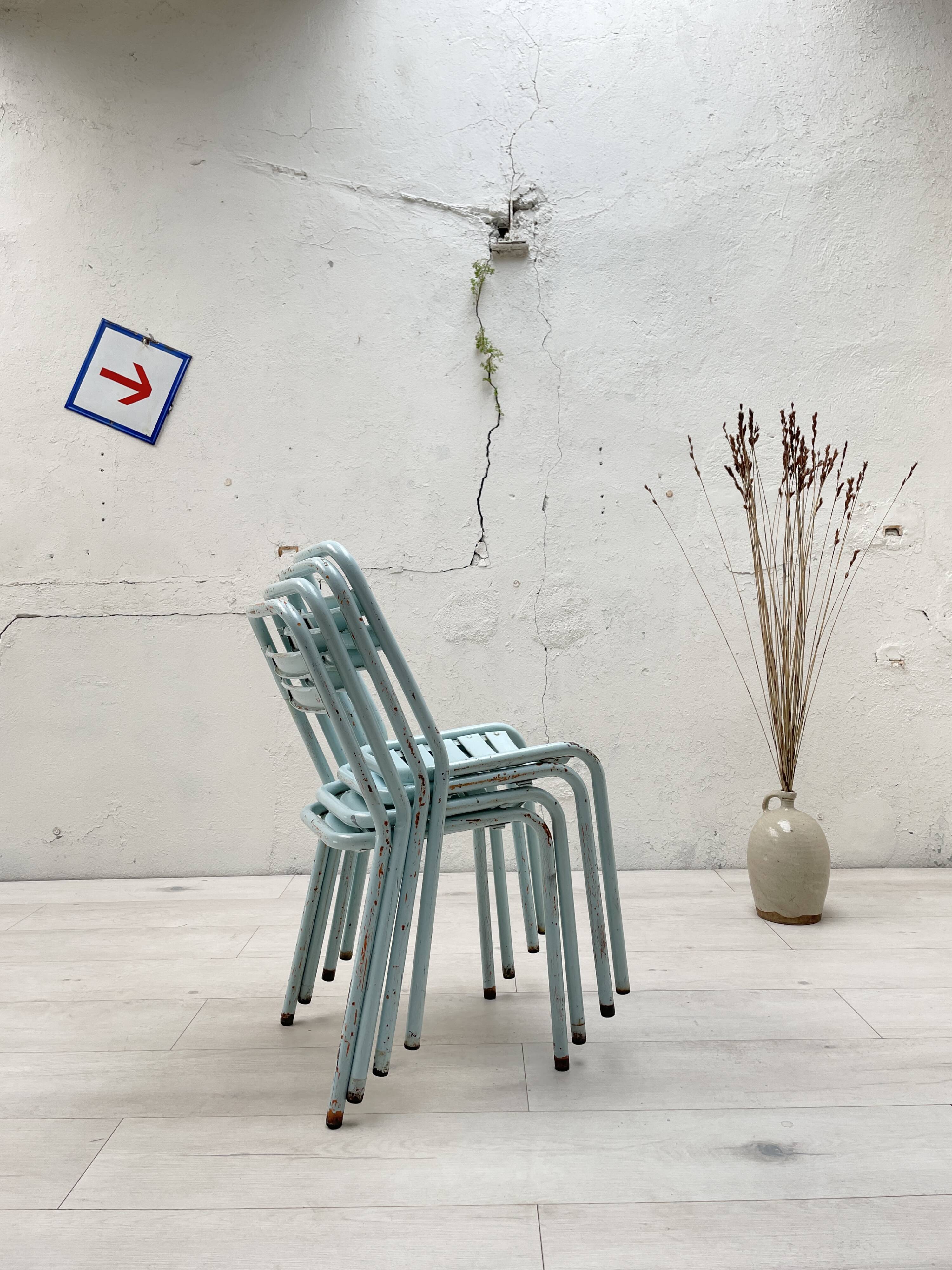 Set of four Tolix T2 chairs, circa 1950.