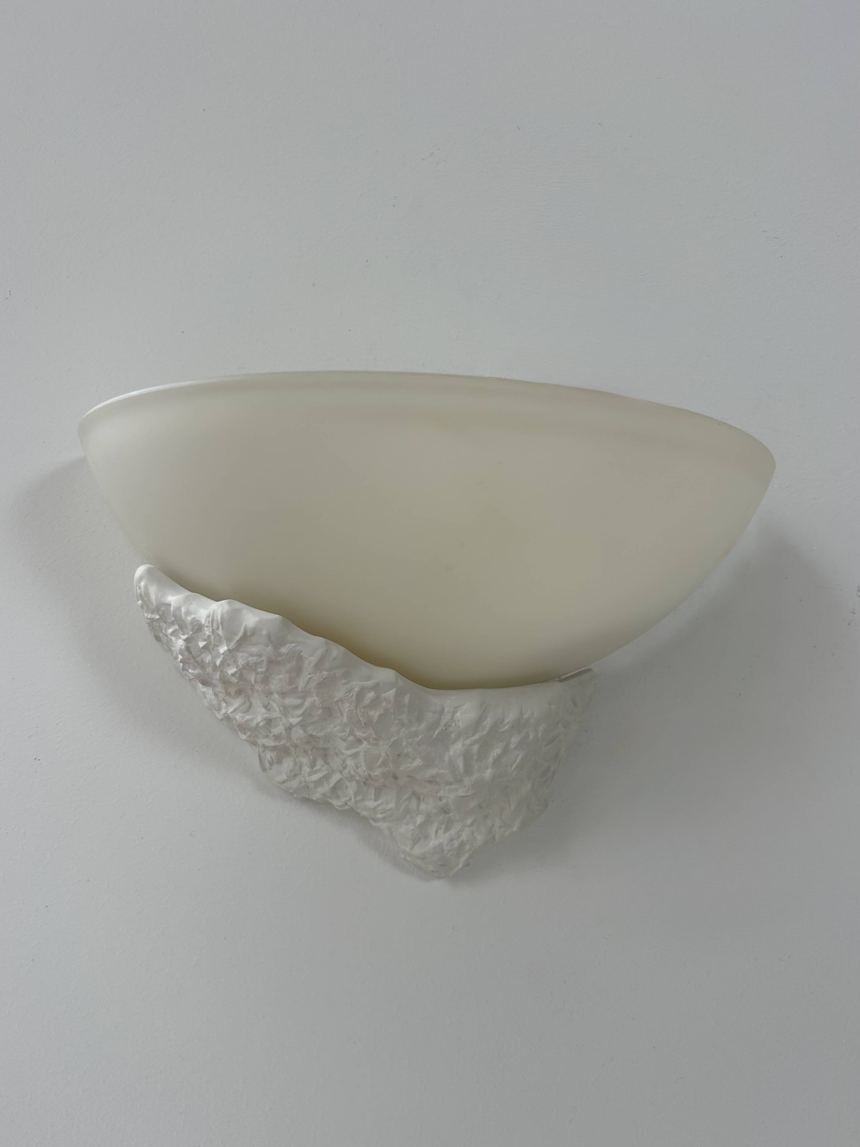 Pair of plaster and frosted glass wall lights, France, 1970.