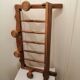 Rustic wooden wall coat rack