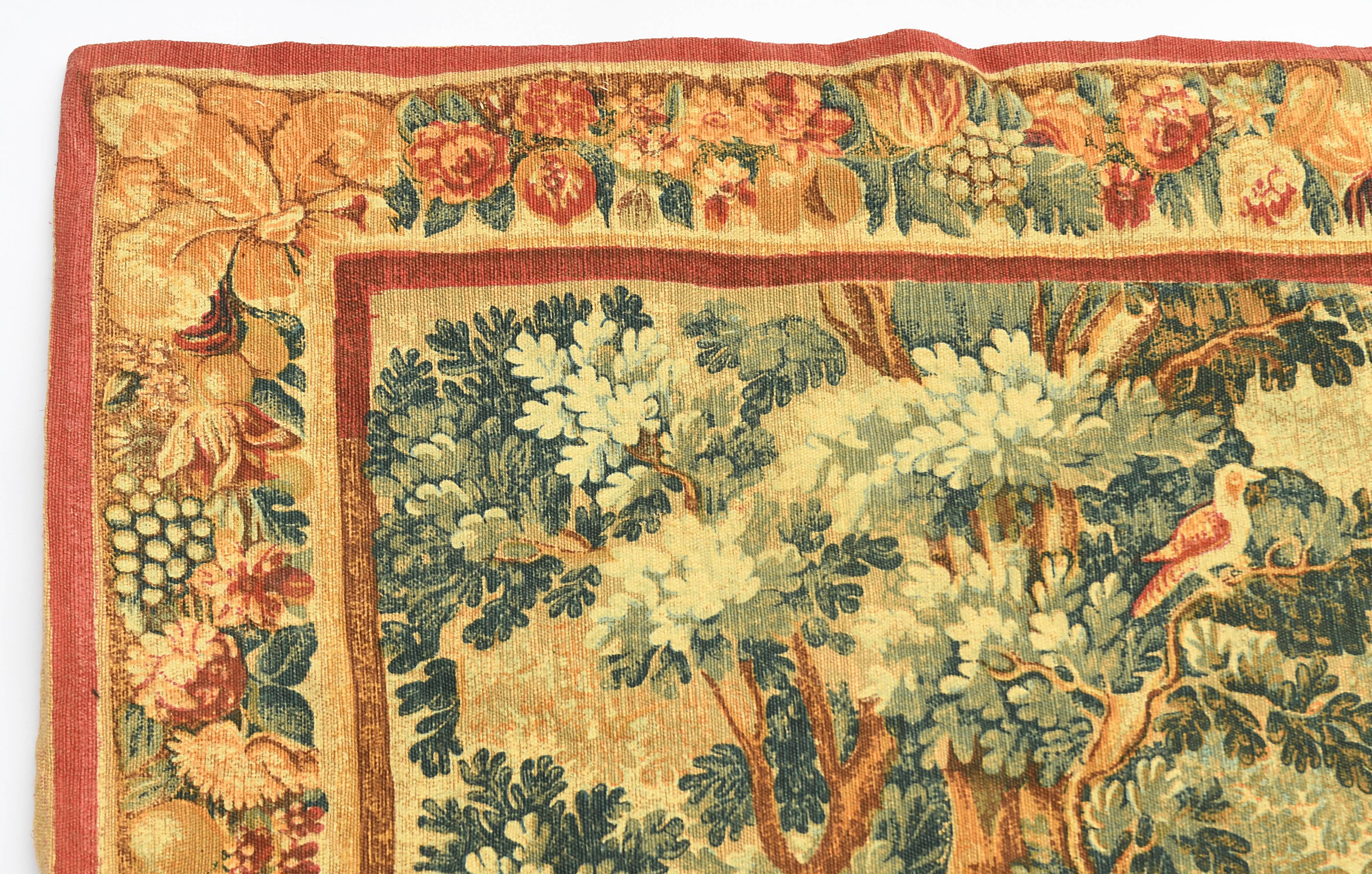 Printed green tapestry depicting birds in the park of a castle