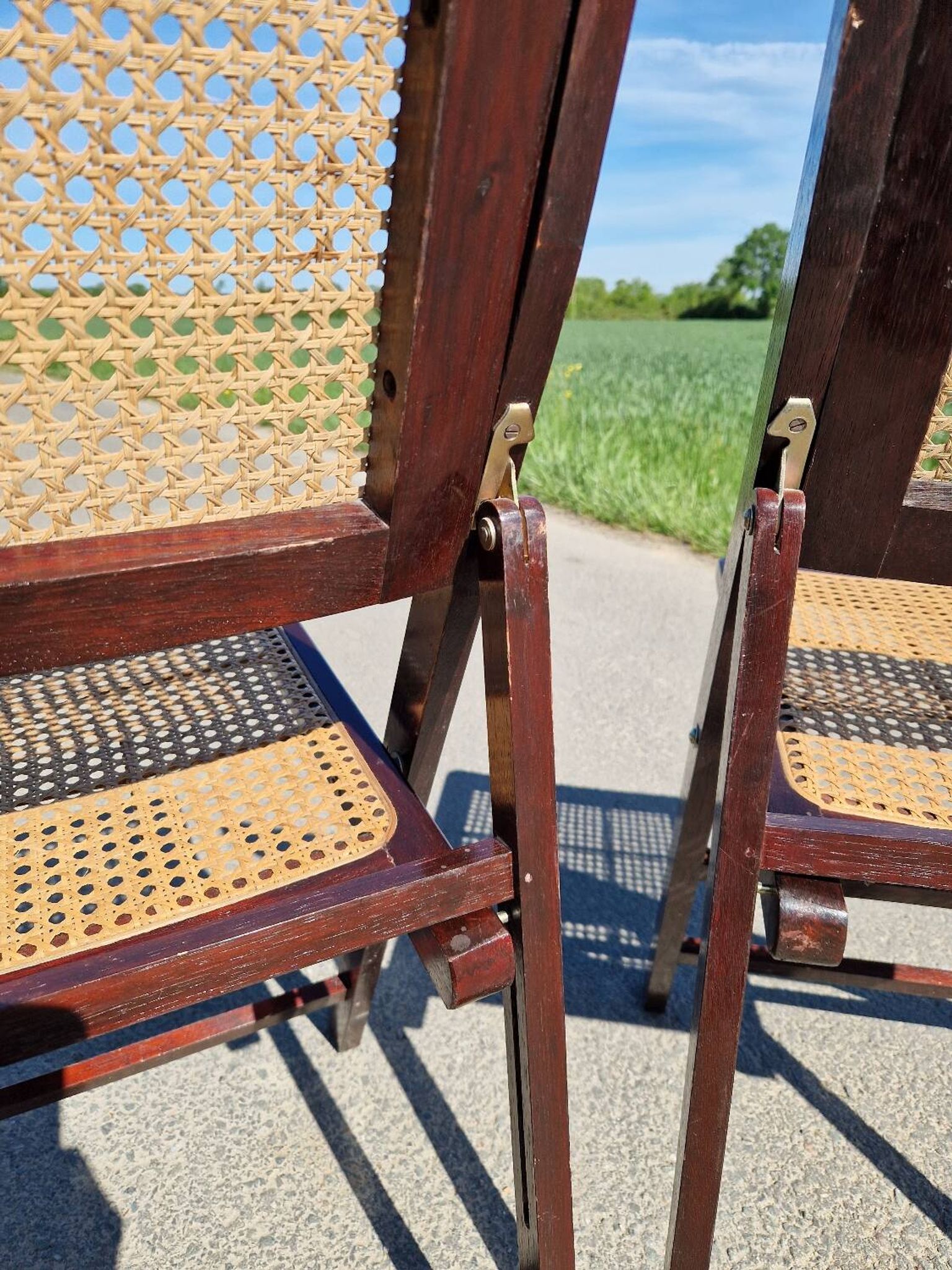 Lot de 2 chaises pliantes en bois et cannage