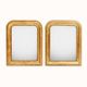 Set of two small French Louis-Philippe gilt red mirrors from the 19th century.