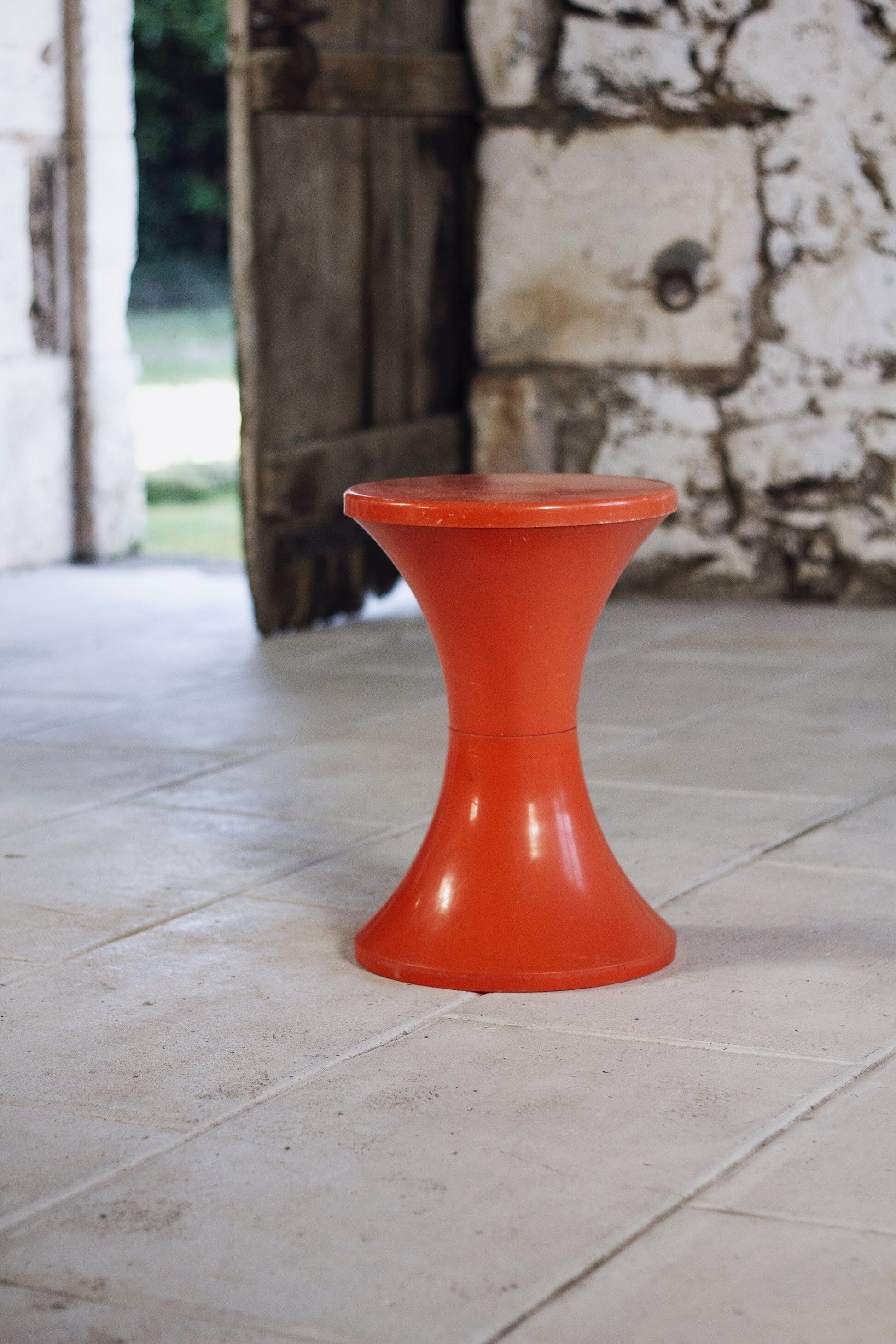 Dark orange Tam Tam stool by Henri Massonnet for Stamp, 1970
