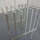 Steel magazine or record racks, 1960s, set of 2