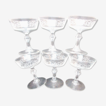6 Louis XV style champagne glasses engraved with arabesques, baluster foot