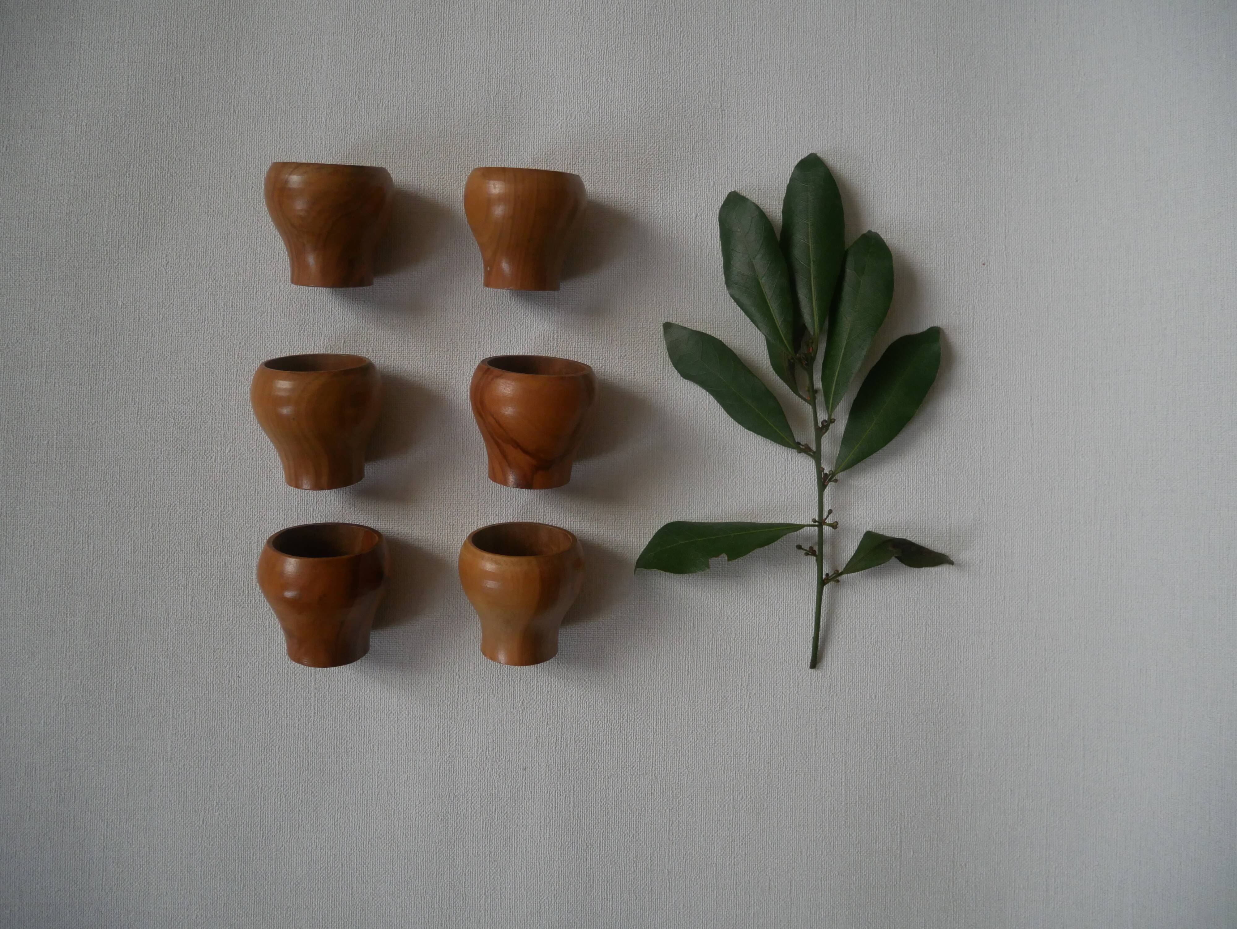 Set of six handmade olive wood egg cups