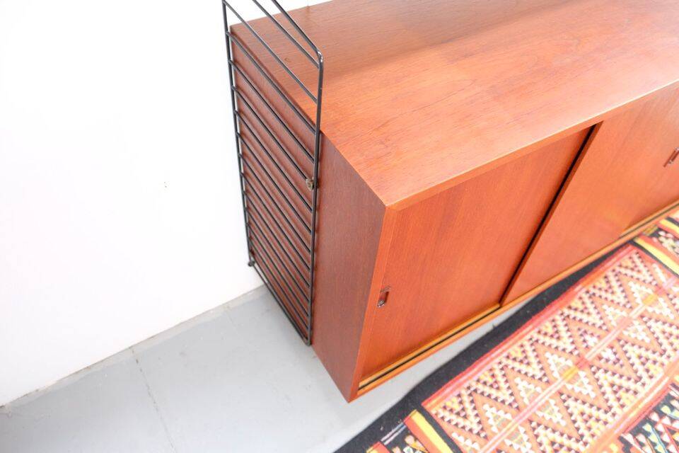 Nisse String shelf in teak, retro vintage style from the 60s-70s.