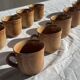 Lot de 11 tasses à café en grès à anse