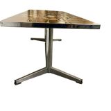 Vintage ceramic coffee table with a chrome frame.