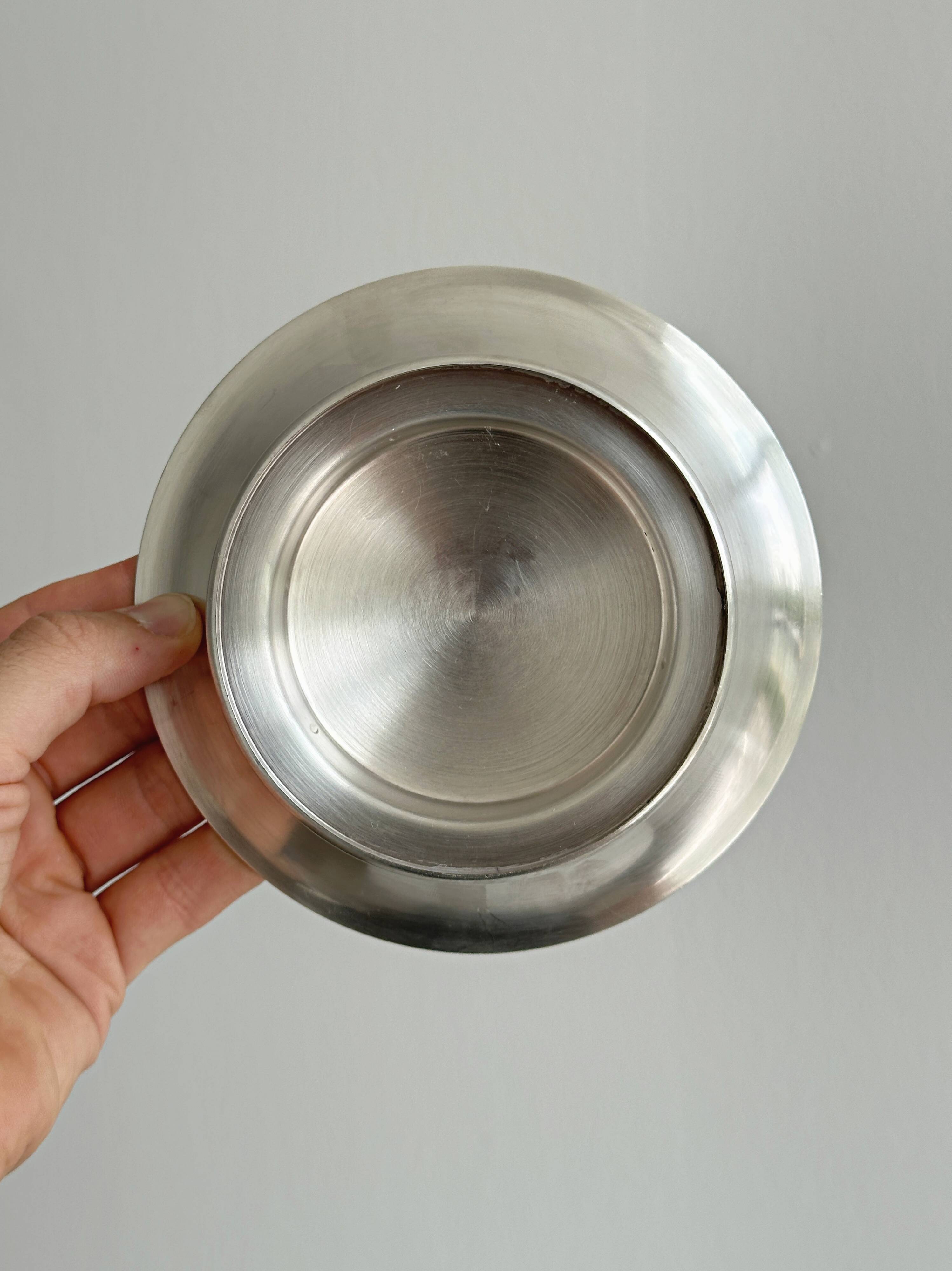 Antique shiny metal butter dish