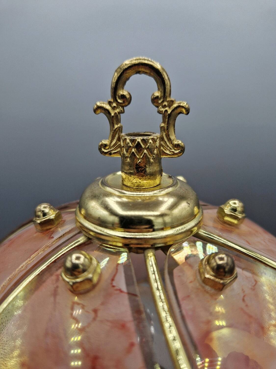 Vintage pink glass globe lamp with brass details and pink base