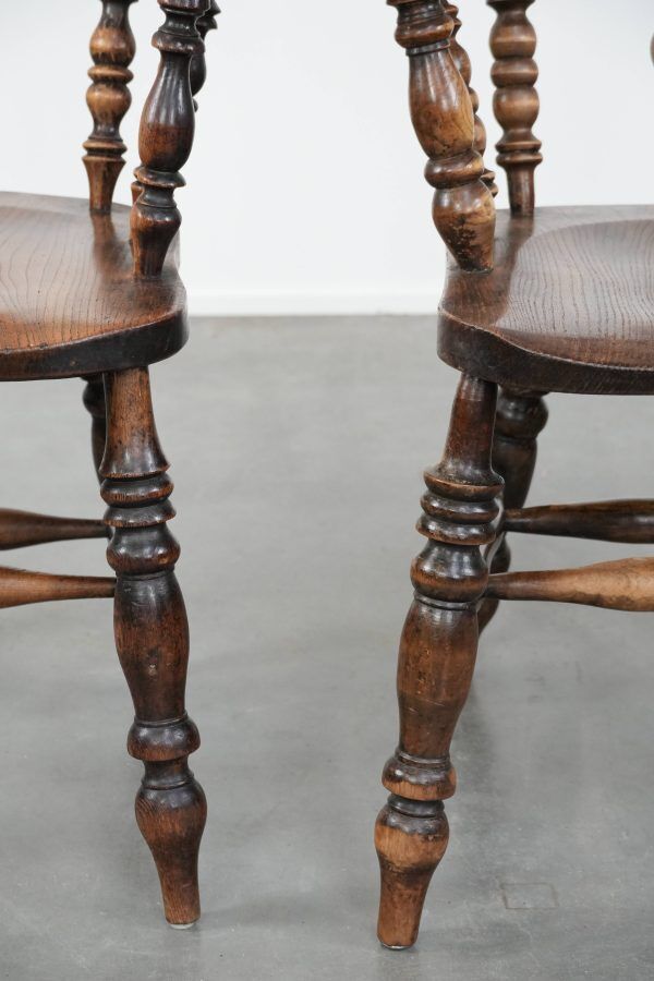 Set of two antique English highback Windsor chairs from the 18th century