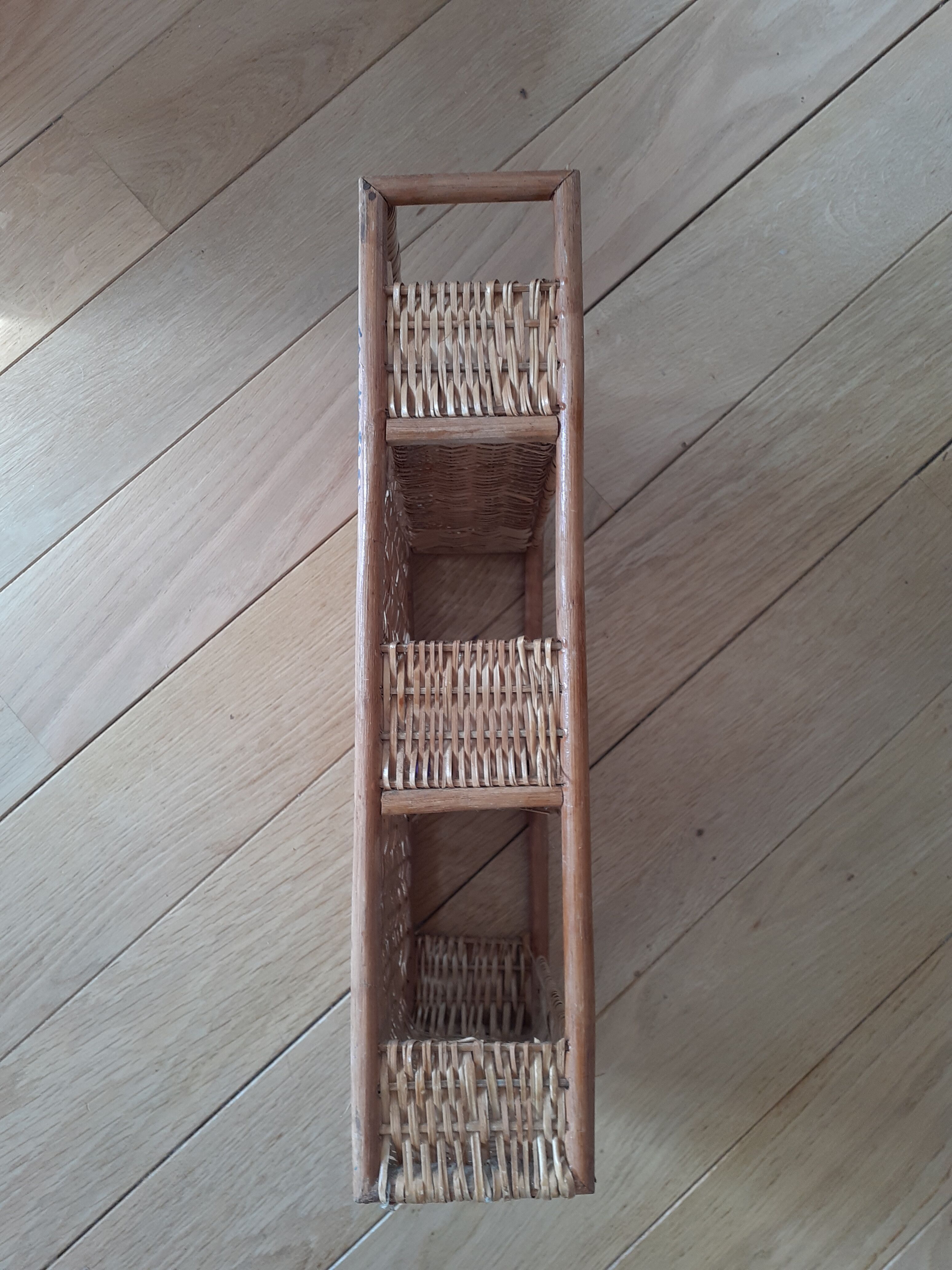 Rattan and wicker wall shelf