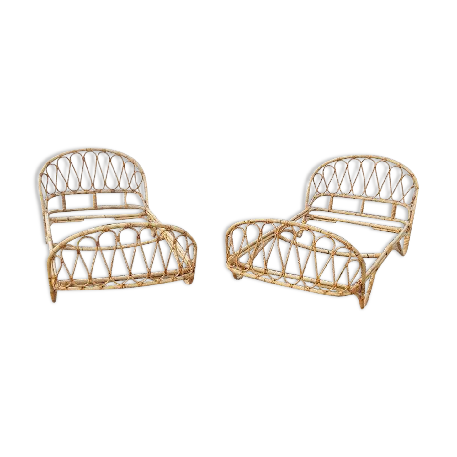 Old rattan bed pair