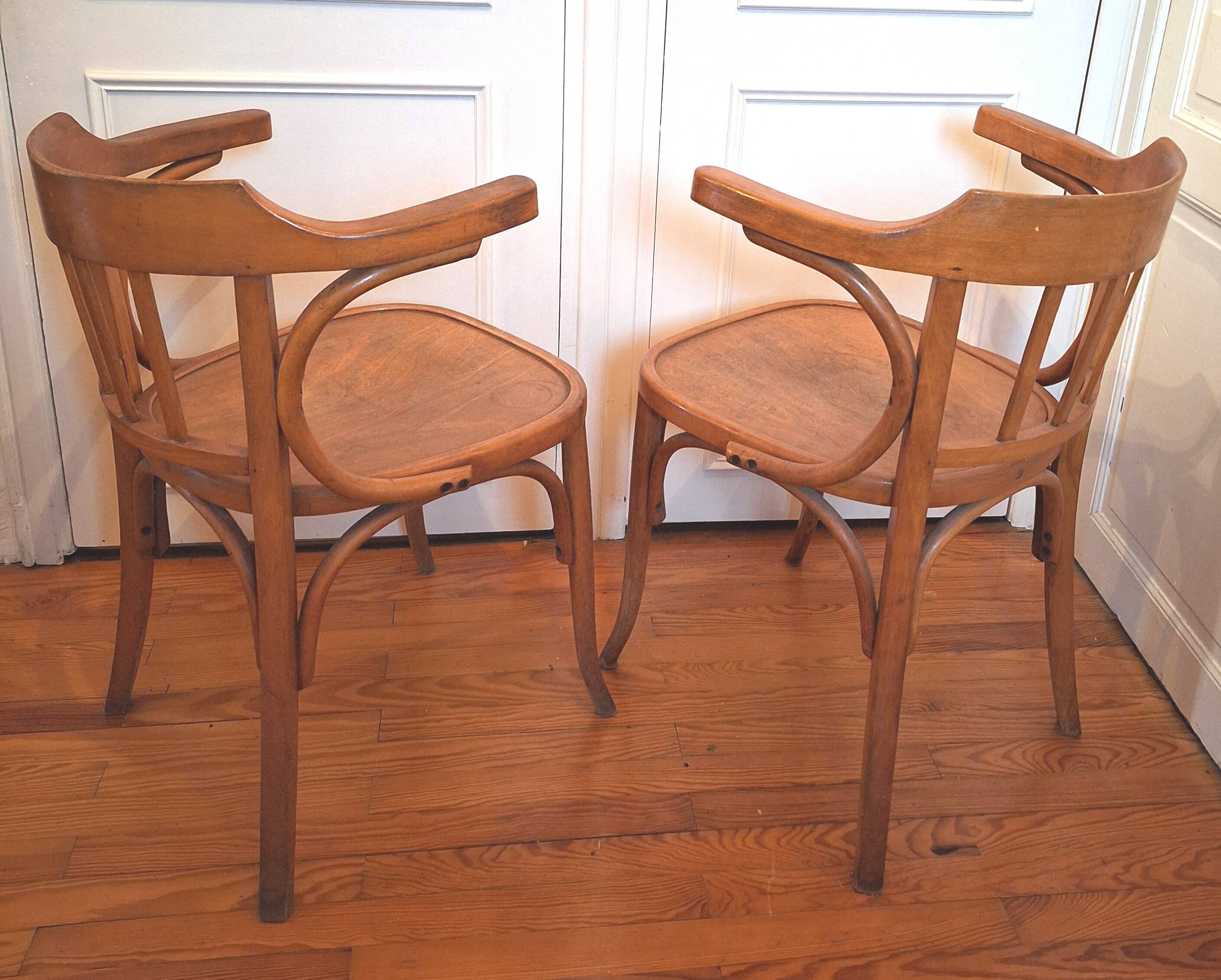 Curved wooden armchair