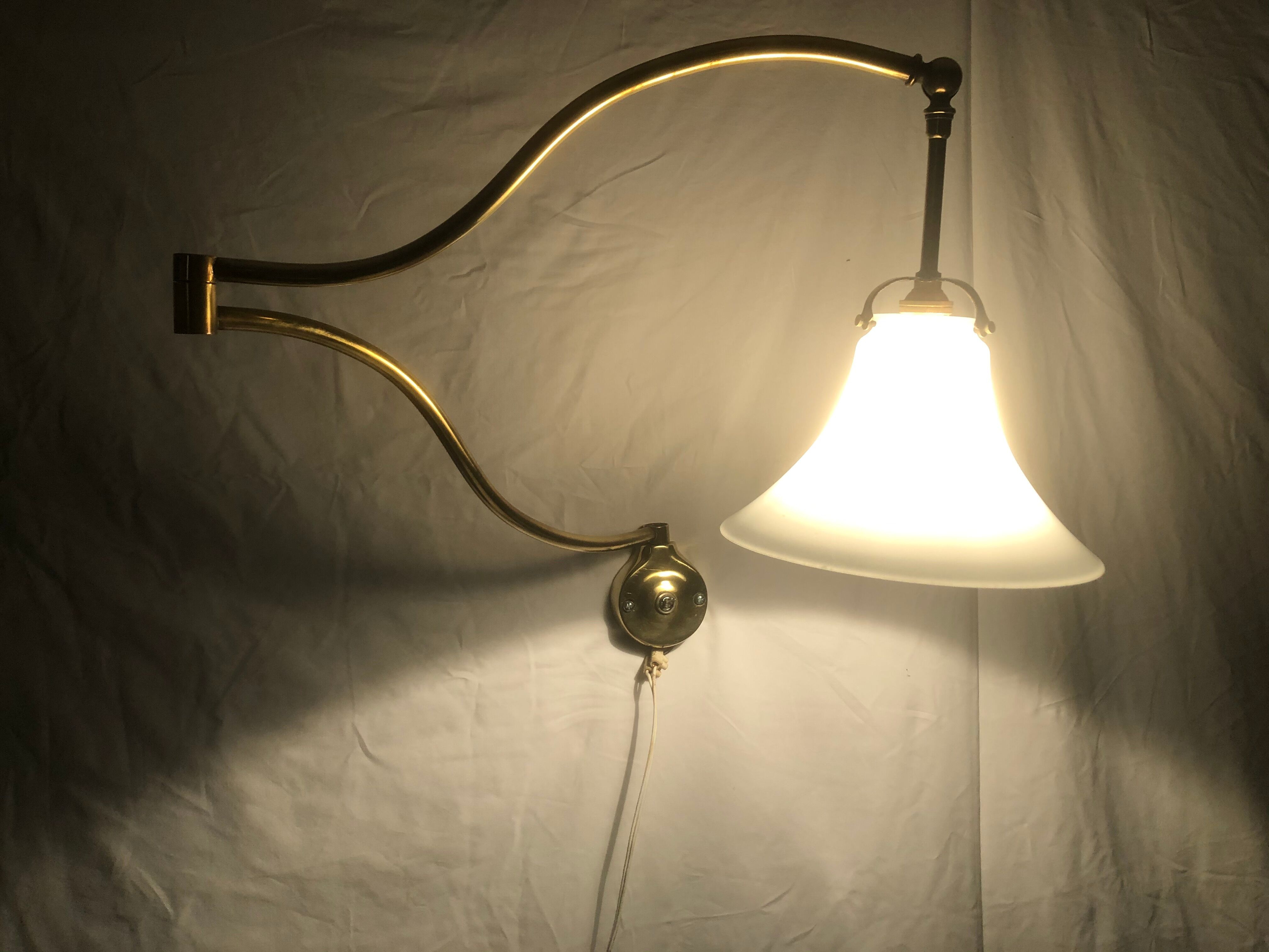 Articulated brass sconce 1950