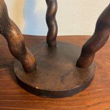 Round wooden tripod stool