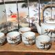Asian set of a teapot and its cups