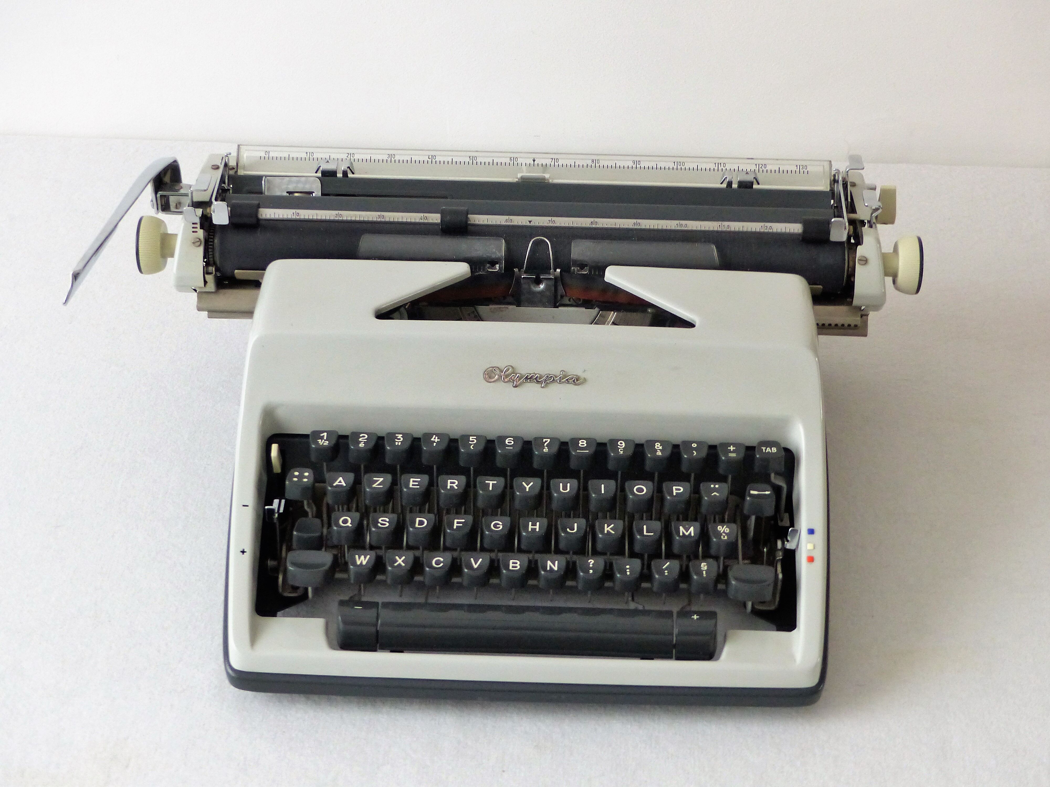 Olympia typewriter in his suitcase