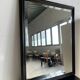Rectangular mirror in molded blackened wood, beveled glass