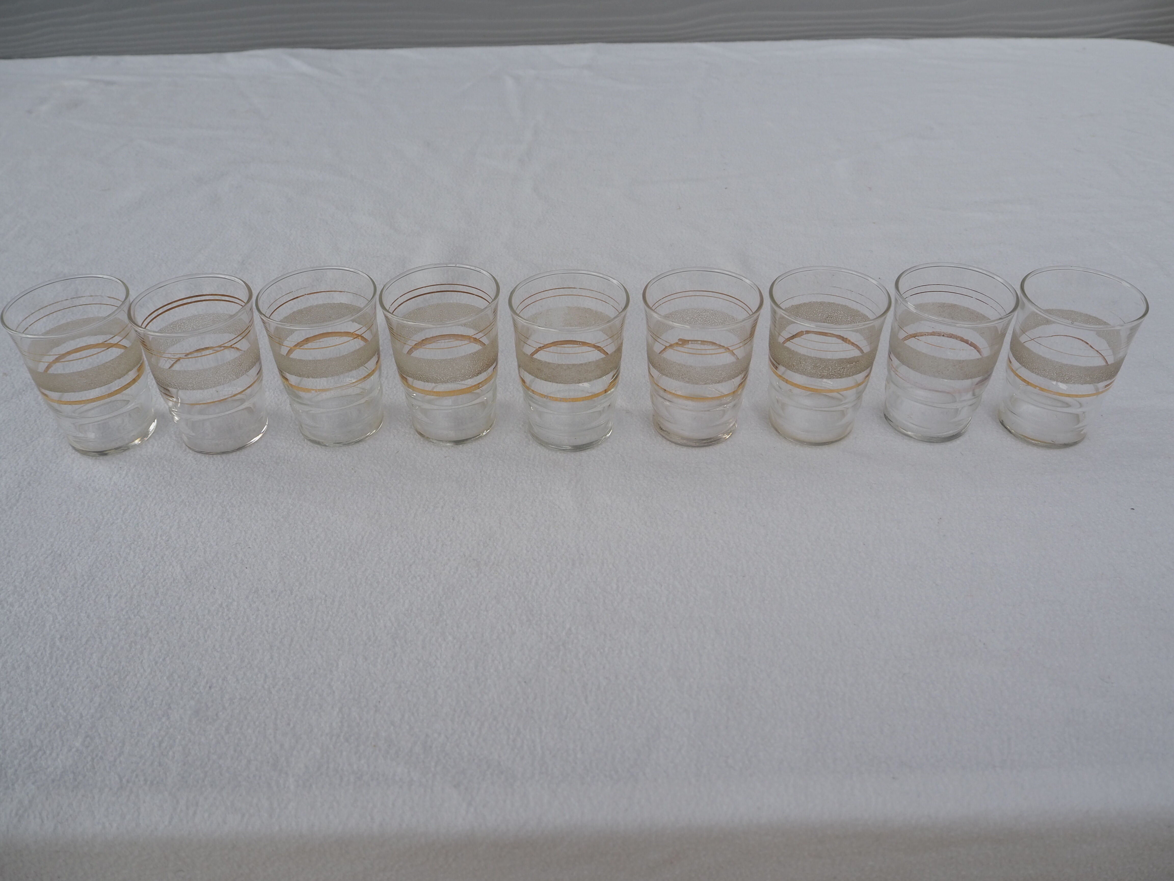 9 wine glasses, gold edging and granite – 1960s-1970s