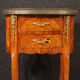 Pair of oval bedside tables in marquetry from the 20th century.