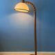 Mid-century floor lamp in brown wood by Steinhauer with an acrylic glass shade.