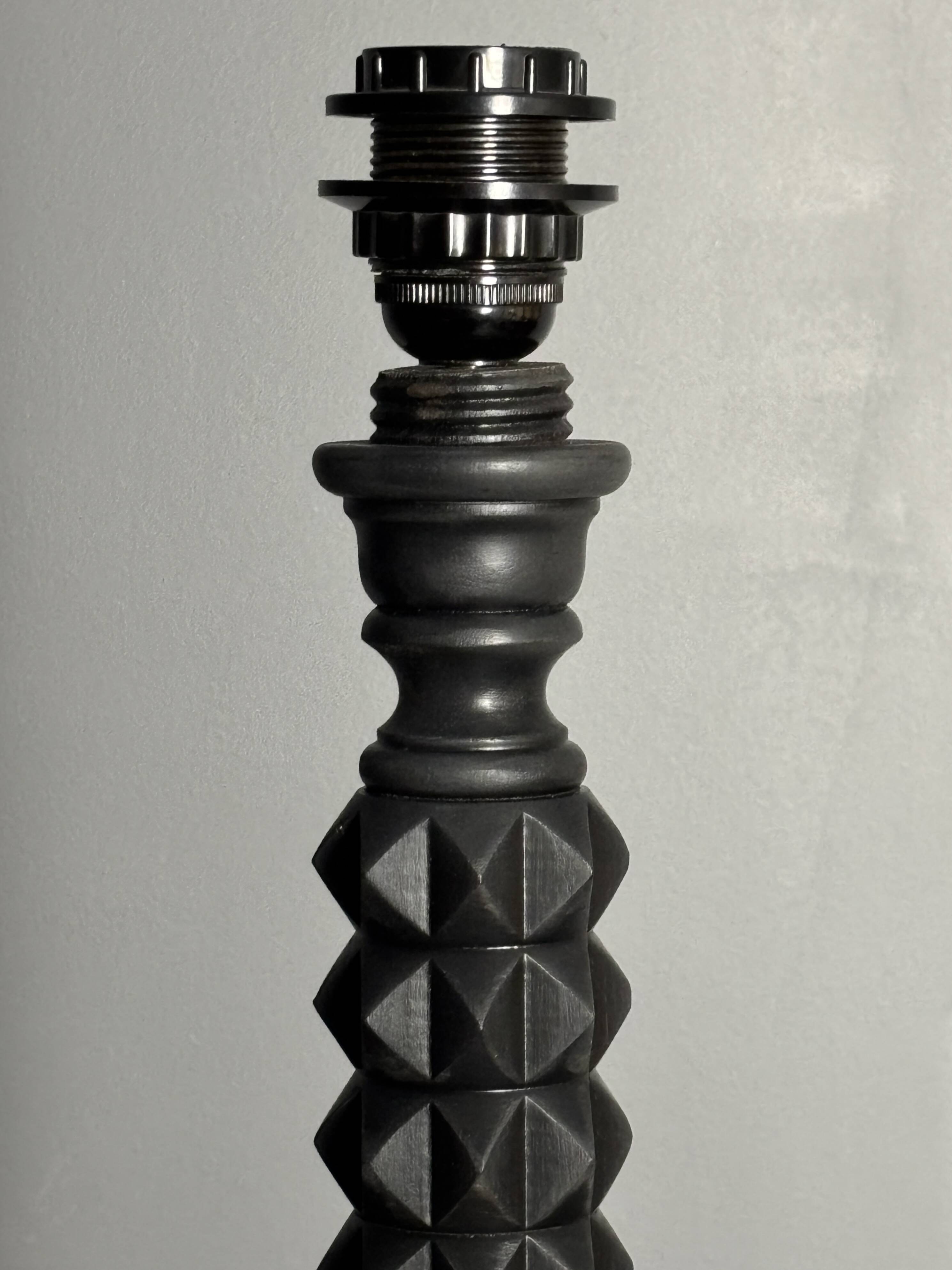 Brutalist wood turned ebonized table lamp in the style of Charles Dudouyt