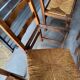 8 oak chairs with straw seats