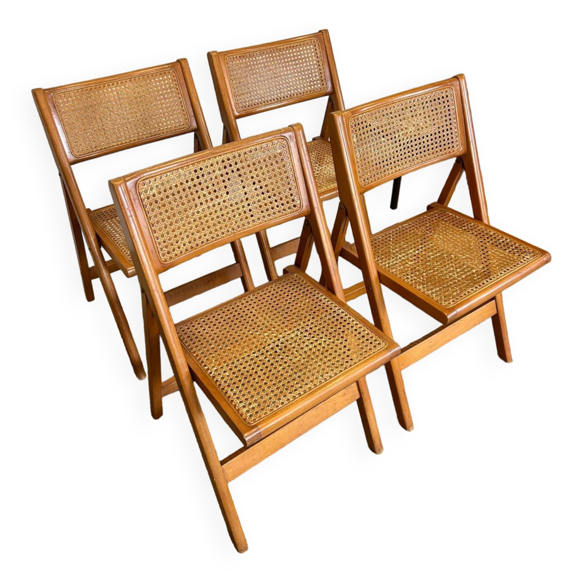 Quatre chaises pliantes cannées 1970