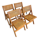 Quatre chaises pliantes cannées 1970