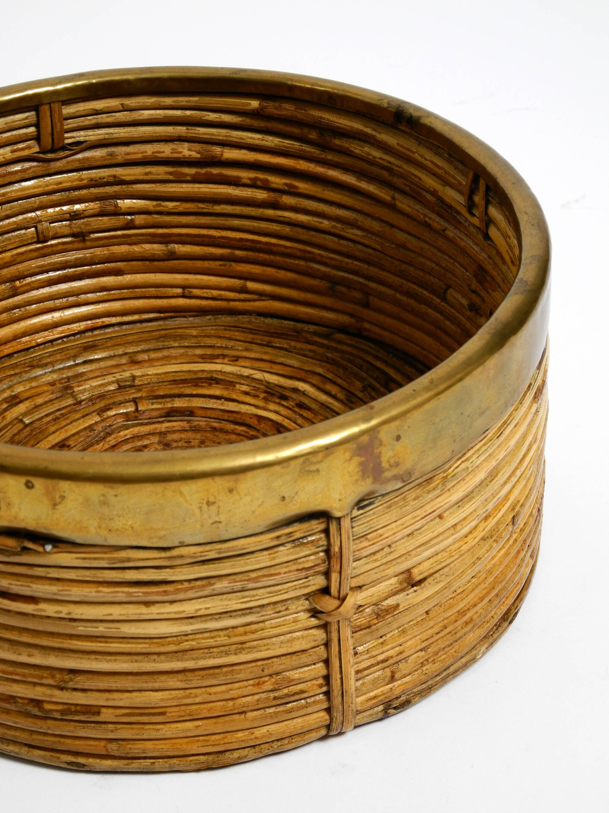 A pair of beautiful Italian Mid Century Modern bamboo bowls with brass rims