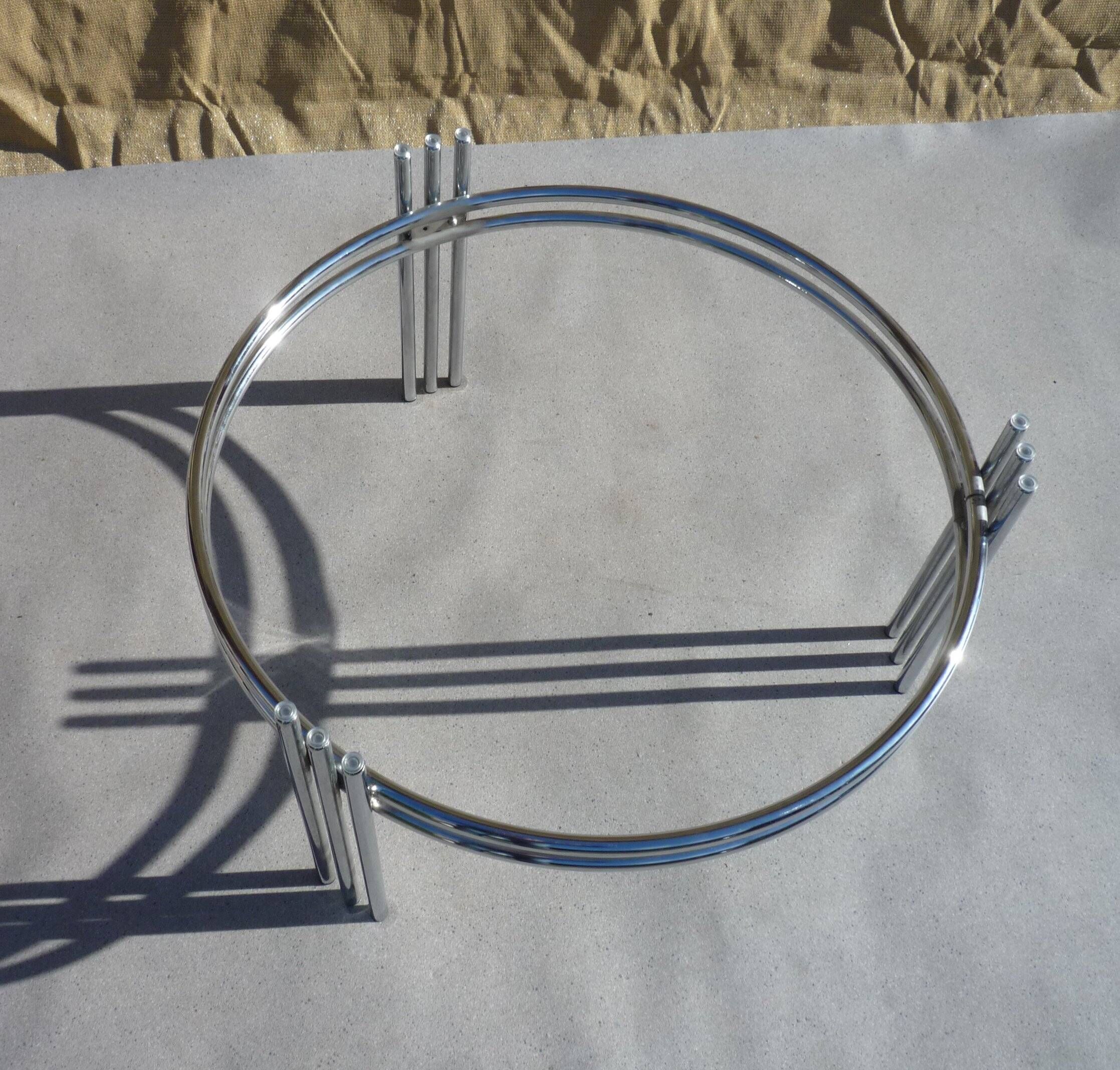 Chrome and glass tripod coffee table