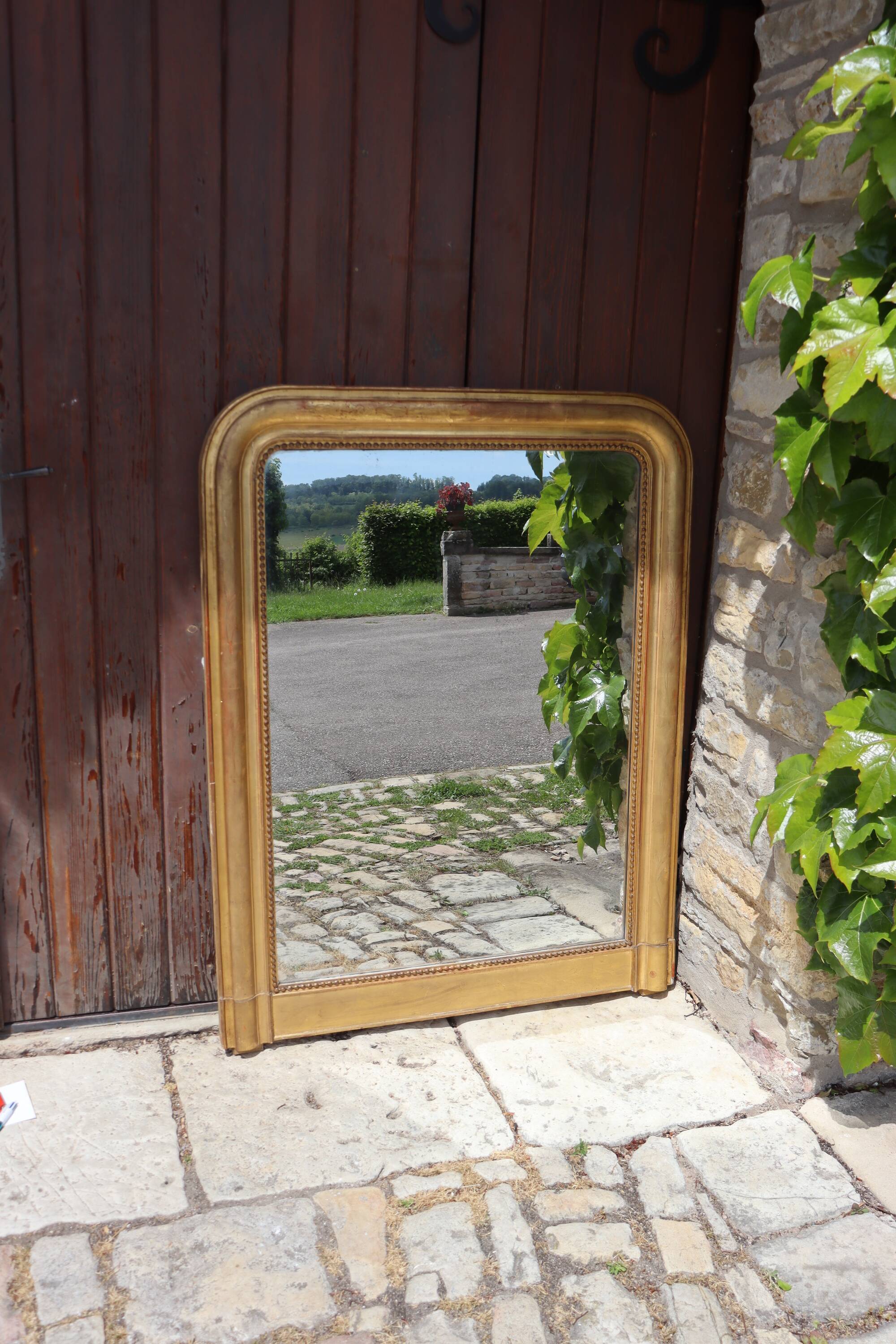 Miroir doré de style Louis Philippe