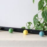 Wall-mounted coat rack, metal and colored wooden hook, 1960