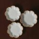 Set of eight small bread plates in white Limoges porcelain