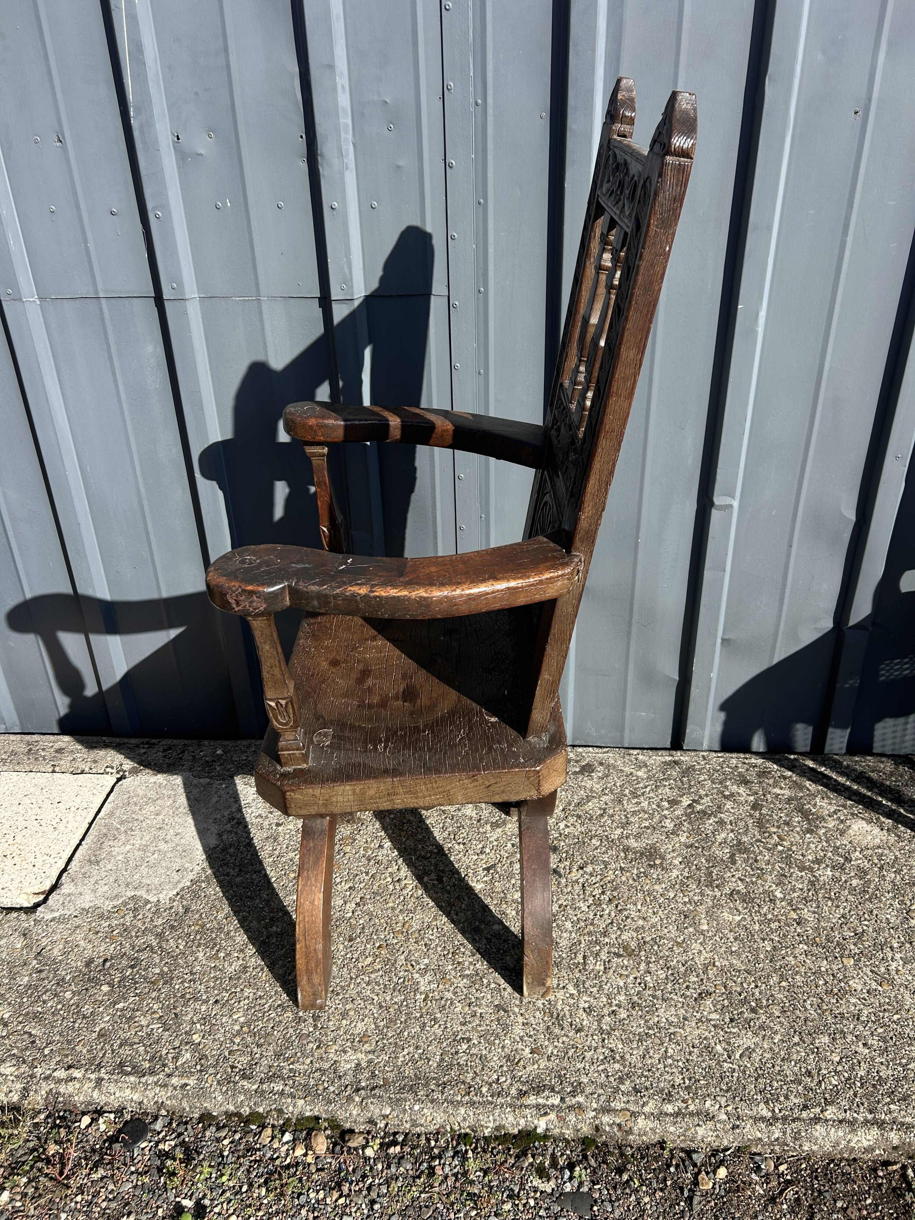 Antique oak armchair, high period