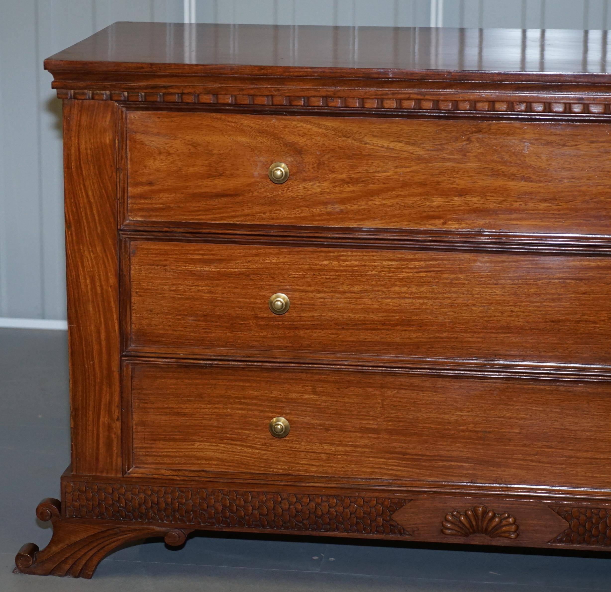 Set of hardwood dressers with finely carved bases.