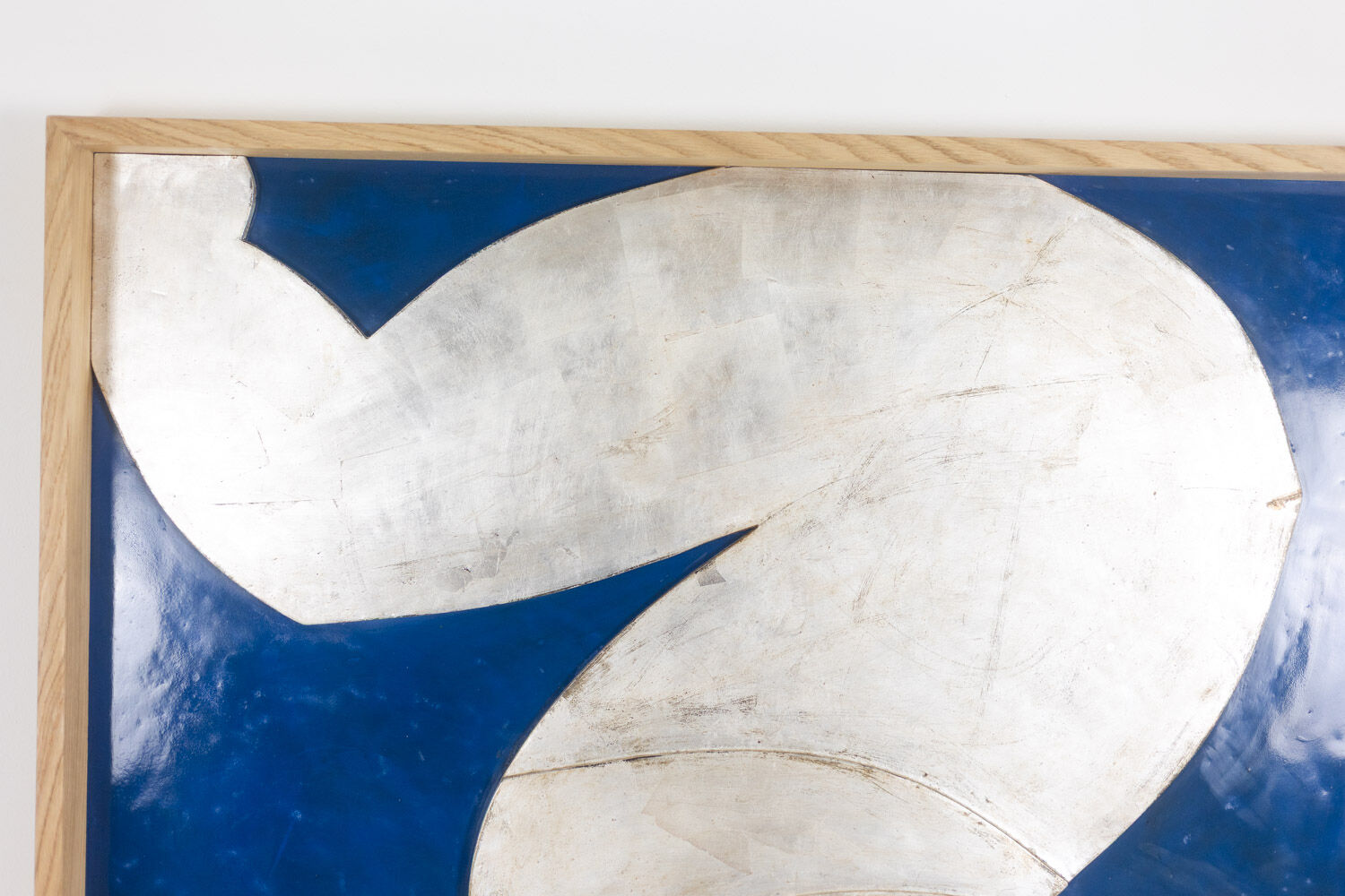 Relief panel "The Acrobat" in silver on a blue background. Contemporary.