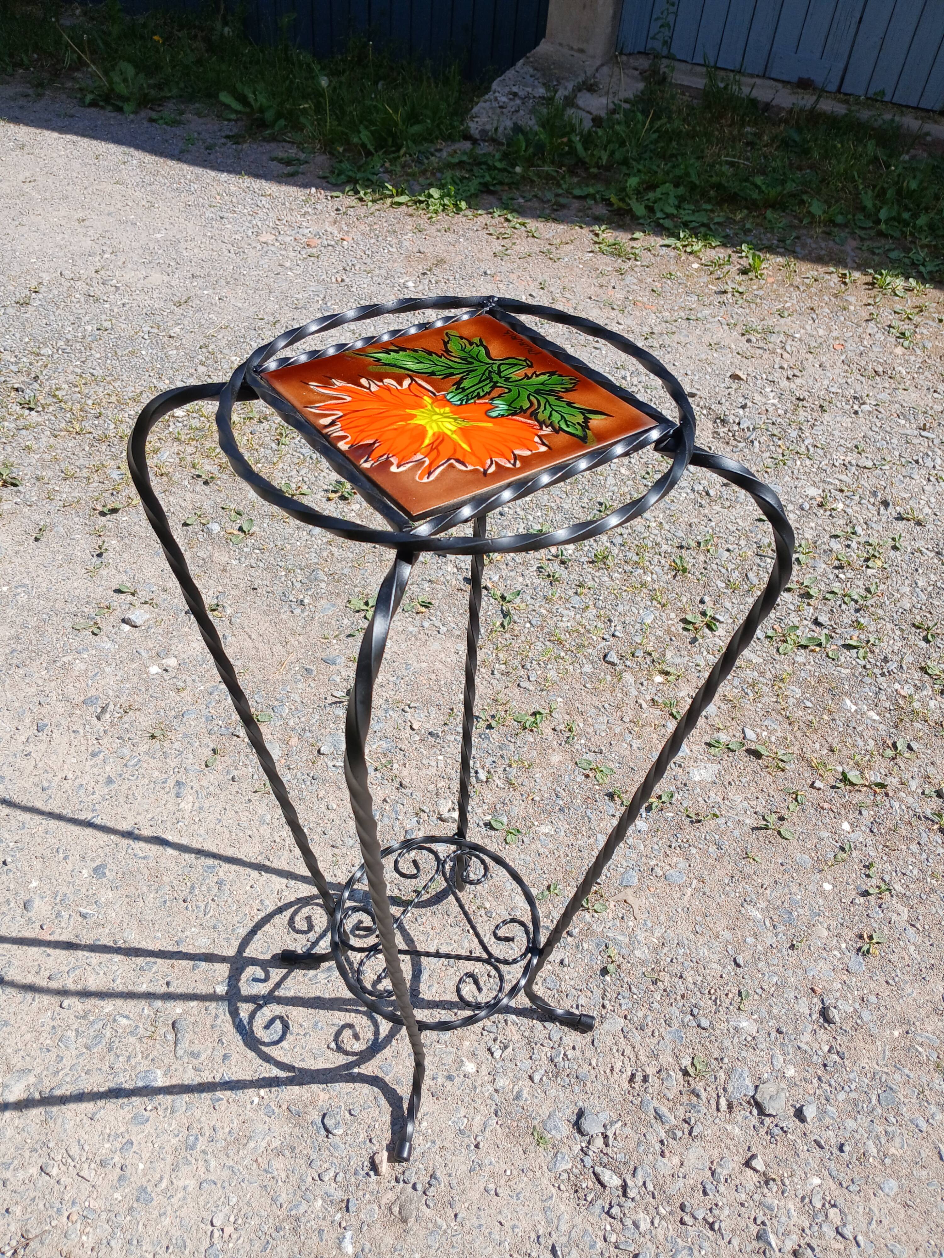 Vintage plant stand with Vallauris pottery.
