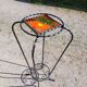Vintage plant stand with Vallauris pottery.