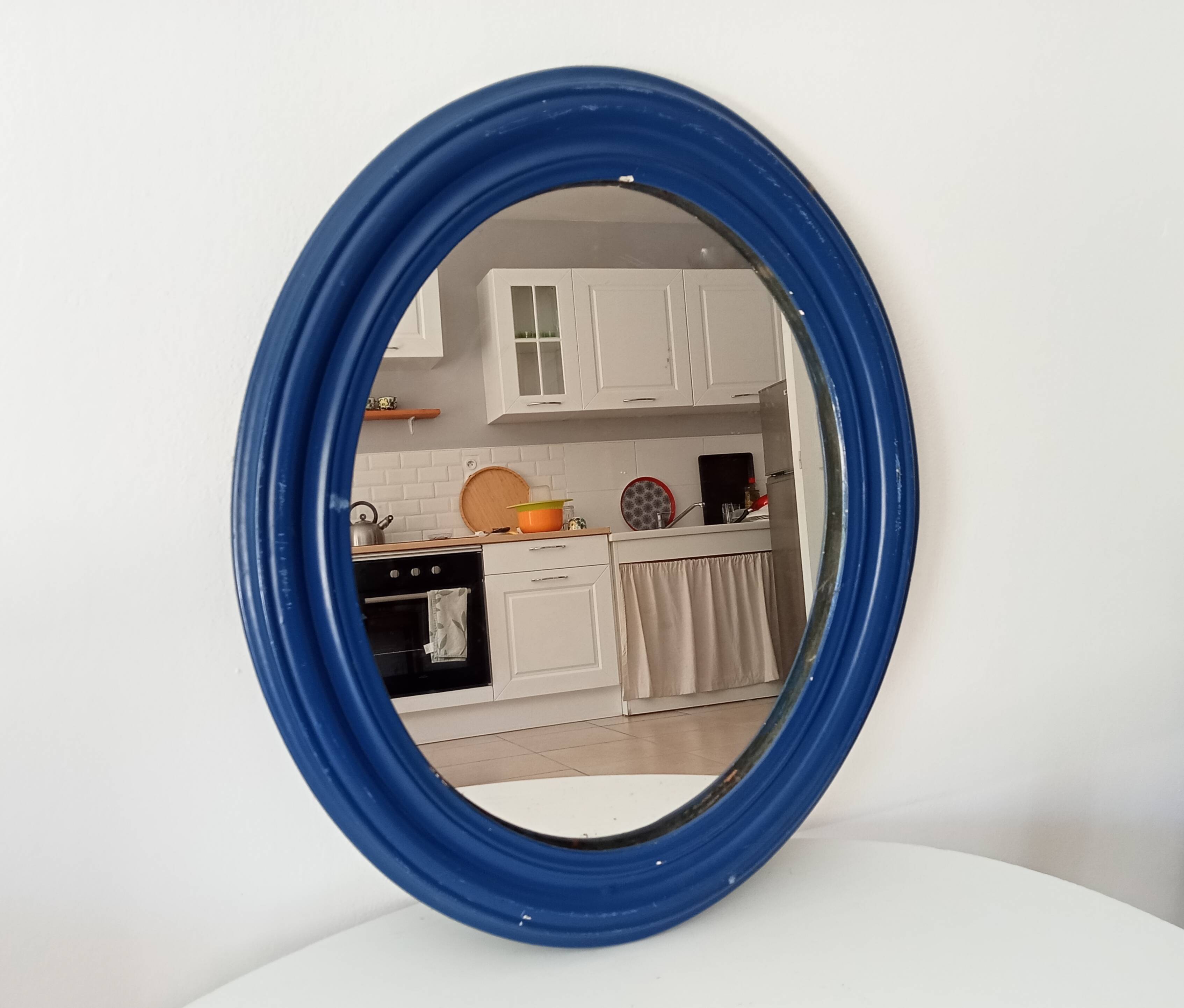 Antique oval mirror in wood and stucco, early 20th century, 51*43 cm