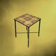 Occasional table in wrought iron and ceramic – 1960s-1970s