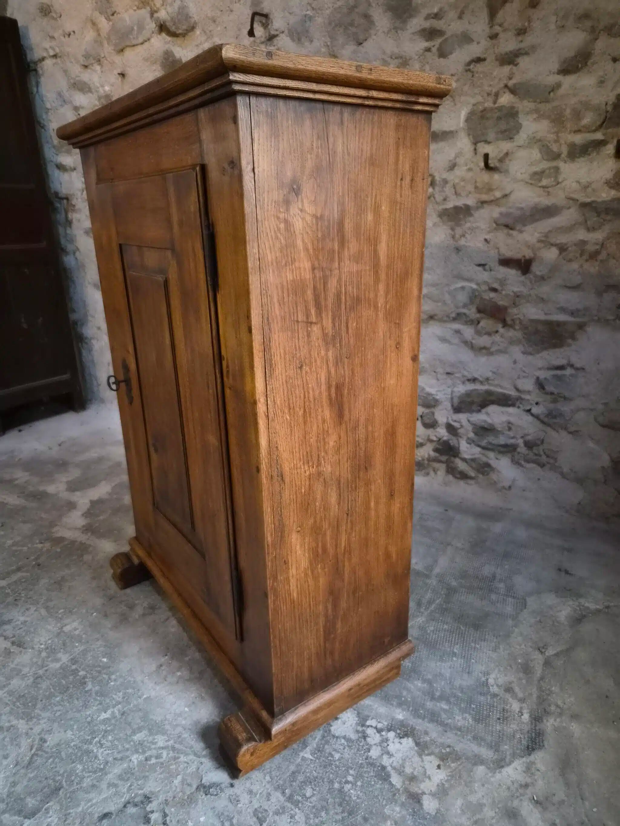 French antique oak wardrobe with one door, 18th century.